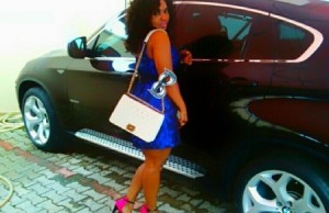 halima-poses-with-a-bmw-car-recently